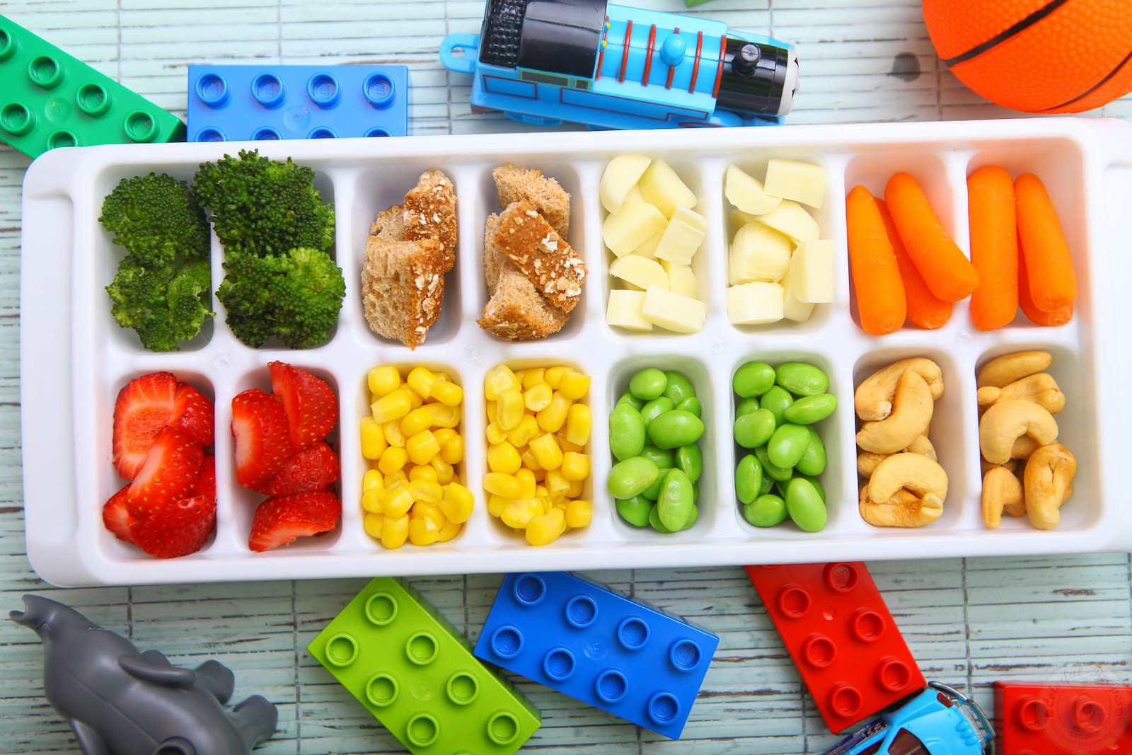 Prepare snacks with different colored fruits and vegetables